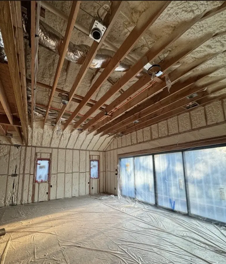Interior walls and ceiling insulated with spray foam during new construction in Kenmore